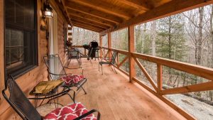 Sandstone Oasis log cabin porch view